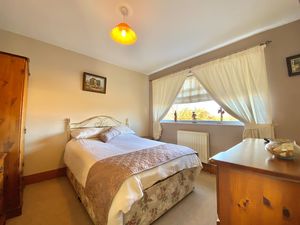 Bedroom One- click for photo gallery